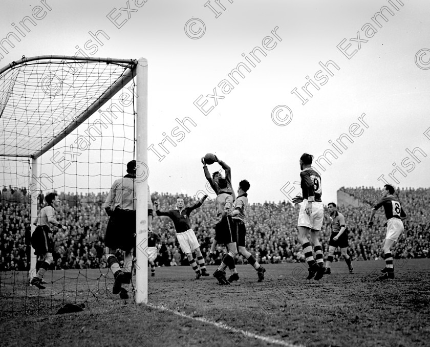 324959 
 Action from the all Cork F.A.I. Cup Final at Dalymount Park, Dublin between Evergreen United and Cork Athletic. Evergreen goalkeeper Barrett gathers the ball. 26/4/1953 Ref. 990E
Echo Book (Sport)