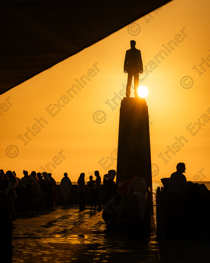 P1056786 
 Grand stretch in the mornings - sunrise swimmers beneath the Roger Casement sculpture, Dun Laoghaire, Dublin