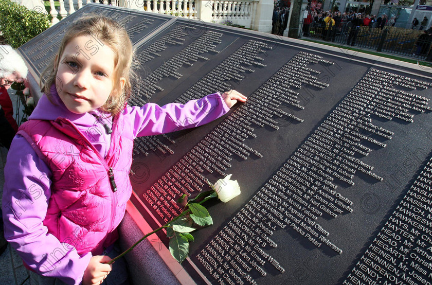 ULSTER Titanic 124195 
 Alex Aaronson 6, from north America, whose descendant Artie Frost 38, perished on the Titanic, in the new memorial garden at Belfast City Hall on the 100th anniversary of the sinking of the Titanic. PRESS ASSOCIATION Photo. Picture date: Sunday April 15, 2012. A minute's silence was held as the memorial was opened in Belfast. A great, great nephew of the ship's doctor helped unveil bronze plaques listing more than 1,500 passengers, crew and musicians who died when the liner struck an iceberg and sank in the North Atlantic on April 15 1912. See PA story ULSTER Titanic. Photo credit should read: Paul Faith/PA Wire