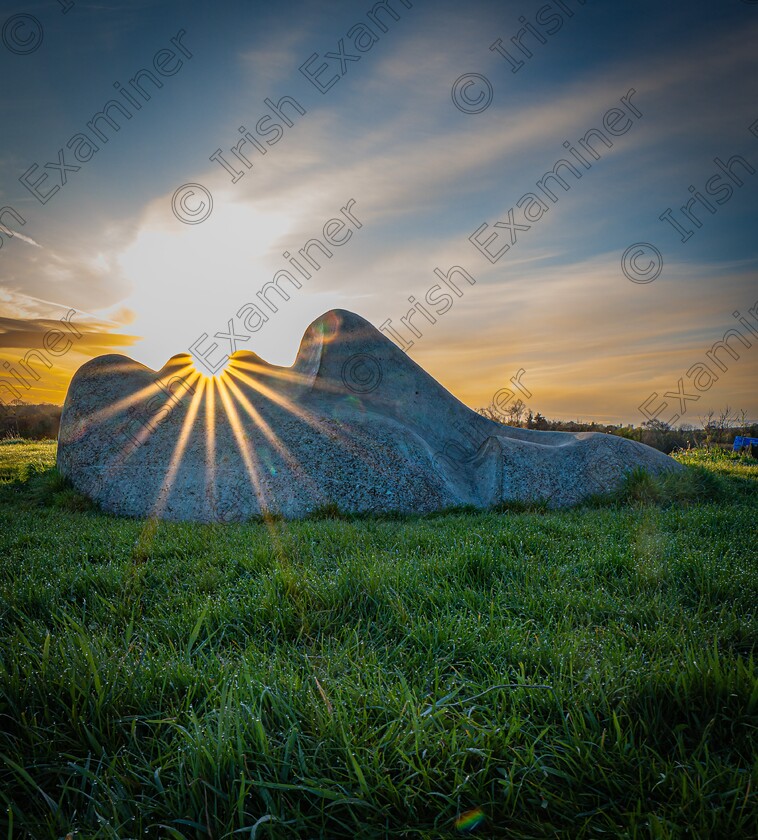 Kissthesun 
 Kiss the sun - 'Dreaming of the Celestial Mountain' art installation by Agnes Conway in Marlay Park, Dublin. Picture taken at sunrise by Stephen Murtagh