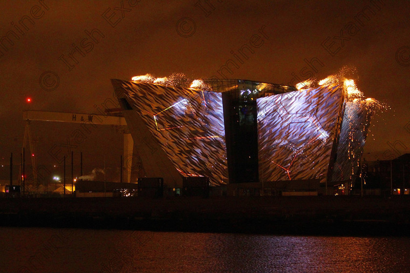 SEA Titanic Belfast 224509 
 Fireworks light the sky over the new Titanic Belfast building as the city continued with its Titanic centenary celebrations. PRESS ASSOCIATION Photo. Picture date: Saturday April 7, 2012. The show, which included synchronised pyrotechnics and 3D graphics, took inspiration from all stages of the Titanic's story - from the doomed liner's construction right through to her maiden voyage. Photo credit should read: Niall Carson/PA Wire