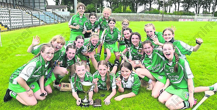 coachford989 
 Coachford team celebrate their win against Curraglass in the DC8 final at the Allianz Sciath na Scol Hurling & Camogie finals at Pairc Ui Rinn on Wednesday. Pic: Larry Cummins
Fotoware