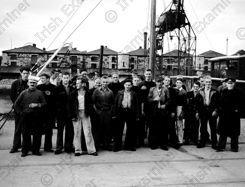 122466 
 SURVIVORS OF THE SS IRISH OAK WHICH WAS TORPEDOED OFF THE CORK COAST. PICTURED IN COBH. 18 MAY 1943.