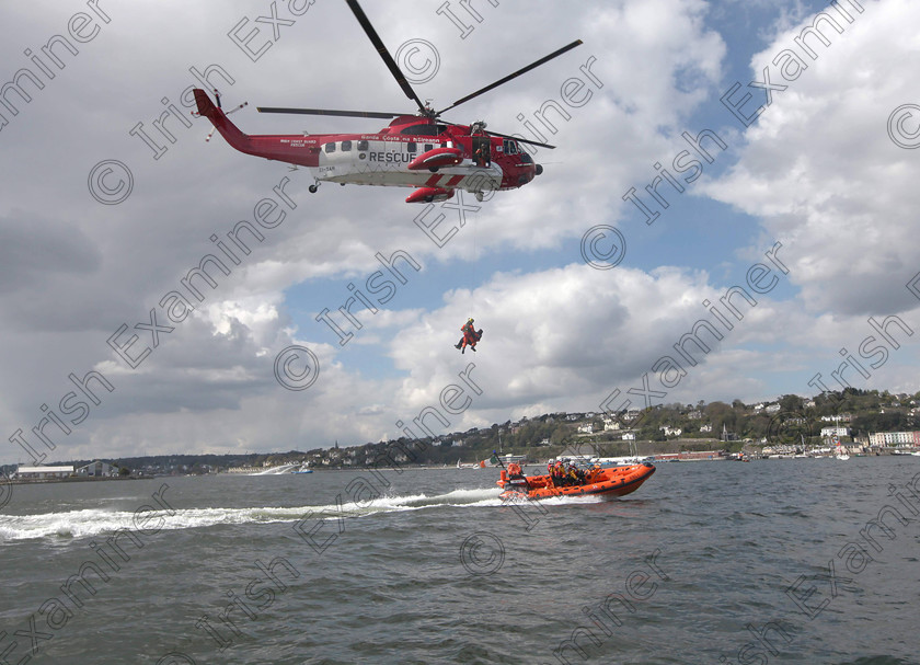 JH Cobh Rescue Display 05 
 ECHO NEWS: 14/04/2012; Waterford rescue helicopter, S61, winching Mike Ahern, Cork Harbour Kayaks, from Crosshaven RNLI during a special search and rescue display by the Irish Coast Guard in Cobh to commemorate the 100th anniversary of the sinking of The Titanic. Picture; John Hennessy (Further Info, Vincent Farr, Crosshaven coastguard, 086 8501802)