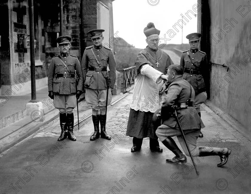 454147 
 For County -
Bishop Daniel Cohalan is greeted by Irish Army officers at Fort Camden in Crosshaven as he arrives to celebrate the first mass at the fort. 17/07/1938 Ref. 183C. Old black and white forts bishops soldiers
(Plese archive)