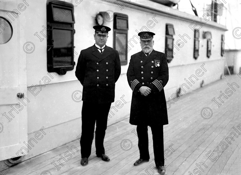 432456 
 Please archive -
In April, 1912 the RMS Titanic called to the port of Queenstown (Cobh) on her maiden voyage. The pride of the White Star Line arrived at Roche's Point at 11.30 a.m. A total of 123 passangers embarked at Queenstown. Three days later the liner struck an iceberg. Of the 2228 passangers and crew aboard only 705 survived. Pictured is Captain Smith (on right), skipper of the Titanic, pictured on board.
Ref.114/115 11/04/1912
Old black and white ships liners disasters