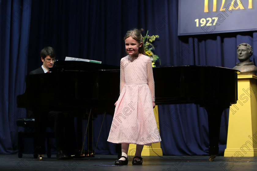 Feis27032018Tue25 
 24~25
Bronze Medal for Eliza Finn singing backed by Accompanist Michael Young.
 Singing Class: 56: 7 Years and Under Crawley The Penguin Dance Feis Maitiú 92nd Festival held in Fr. Mathew Hall. EEjob 27/03/2018 Picture: Gerard Bonus