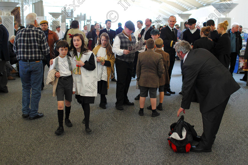 SEA Titanic 131179 
 Young actors in Edwardian costume mingle with passengers waiting to board the Balmoral cruise ship at Southampton docks for the official Titanic centenary voyage. PRESS ASSOCIATION Photo. Picture date: Sunday April 8, 2012. 1,309 passengers will be marking the centenary of the Titanic disaster on the night of April 14, 1912 with lectures and will eat food the same as was served aboard the ill-fated liner. They will then visit Nova Scotia where some of the victims are buried before ending the 12 day trip in New York. Photo credit should read: Chris Ison/PA Wire