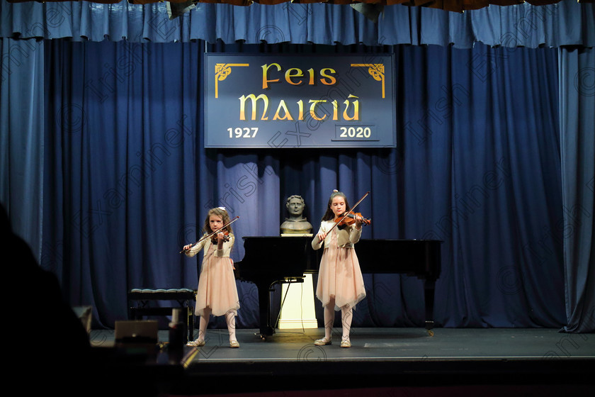 Feis01022020Sat33 
 33
Neasa Randles watching the Adjudicator and Saidhbh watching her Violin.

Class: 267: Junior Duo Class
Feis20: Feis Maitiú festival held in Fr. Mathew Hall: EEjob: 01/02/2020: Picture: Ger Bonus.