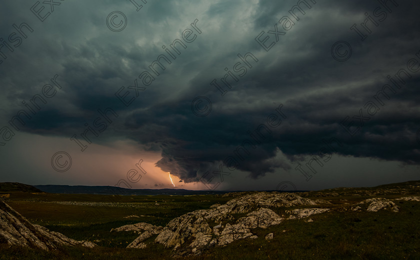 Lightning 
 Storm over the Bens. 
A lightning storm over the 12 Bens in Connemara, taken on the 14th of june 2020 during the lightning storm that swept across the country. Taken on Truska beach looking north west.
Photographer: Johnny Mulvany