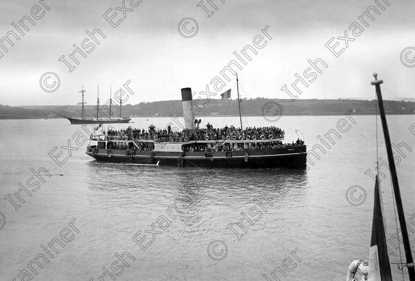 859862 859862 
 For 'READY FOR TARK'
Remains of Fenian patriot John Devoy arrive from the United States on the liner 'Baltic' at Cobh. View of the tender 'Failte' alongside 16/06/1929 Ref. 349A Old black and white ships reinterments repatriation