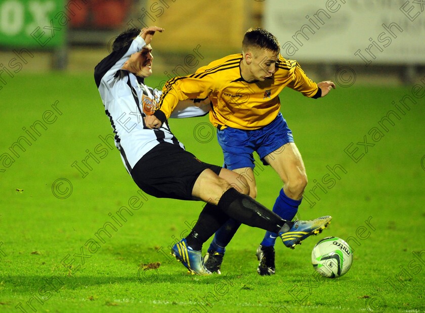 1584975 1584975 
 College Corinthians Evan Browne is tackled by Midleton's Ian Stack during the Keane cup final against Midleton FC at Turners Cross
Picture: Eddie O'Hare