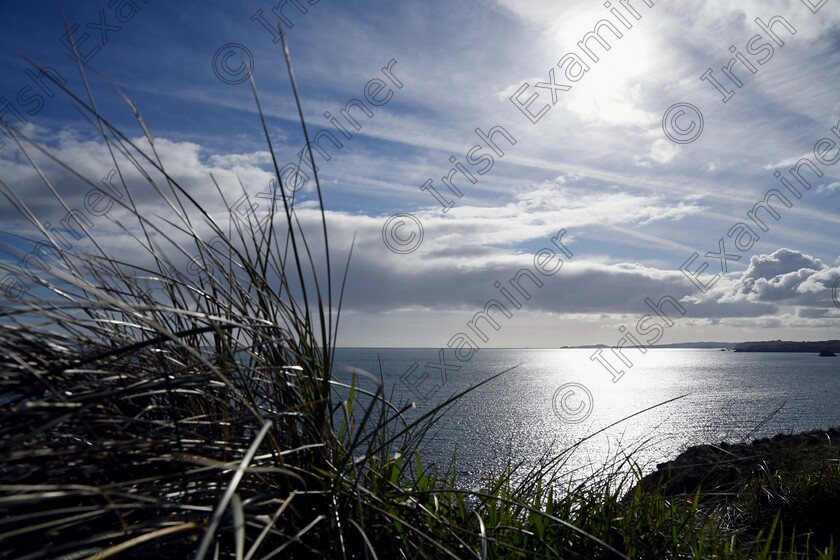 lightonthehorizon 
 IE/THE ECHO LIVE NEWS 07/04/2021. Looking out over the West Cork coastline from close to Long Strand on a sunny but cool afternoon. Picture Denis Minihane.