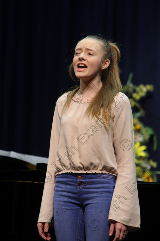 Feis08032018Thu09 
 9
Lasairfhiona de Brún performing “Requiem”.
 Singing and School Choirs Class: 112: “The C.A.D.A. Perpetual Trophy” Solo Action Song 14 Years and Under Section 2 Feis Maitiú 92nd Festival held in Fr. Mathew Hall. EEjob 06/03/2018 Picture: Gerard Bonus.