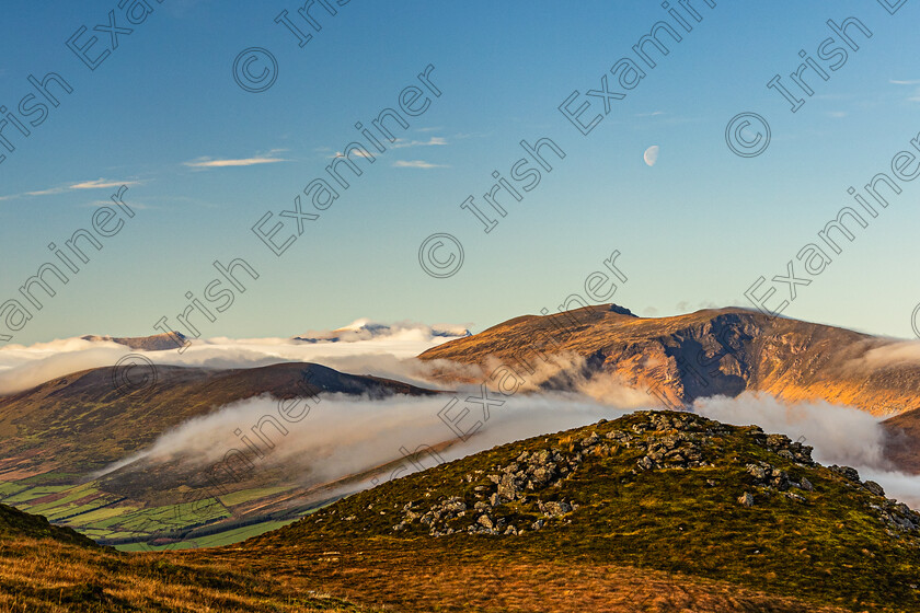 Stradbally Beenoskee Brandon-low cloud-8550 
 Stradbally Mt, Beenoskee Mt and Mt Brandon in the distance above the low cloud.All in Co Kerry -taken from Moanlaur Inch in Dec 2023 by Noel O Neill 
 Keywords: Beenoskee, Beheenagh, Brandon, Cloud inversion, DHC, inch