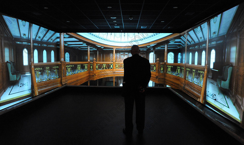 Titanic Belfast Preview 4 0 
 Alan Lewis - PhotopressBelfast.co.uk 27/3/2012
Mandatory Credit - Picture by Justin Kernoghan
A visitor enjoying the 3D cube which allows you to take a tour of the inside of the Titanic in 3D at the Titanic Belfast building today. 
Opening in March 2012, Titanic Belfast® will be a "must see" visit in any tour of Belfast and Northern Ireland. It is located in the heart of Belfast, on the slipways where RMS Titanic was built.
Inside this iconic building, visitors will re-live the entire Titanic story from her birth in Belfast to the fateful maiden voyage and her eventual discovery on the seabed.
Titanic Belfast® extends over nine galleries, with multiple dimensions to the exhibition, drawing together special effects, dark rides, full-scale reconstructions and innovative interactive features to explore the Titanic story in a fresh and insightful way; from her conception in Belfast in the early 1900s, through her construction and launch, to her infamous maiden voyage and catastrophic demise. The journey goes beyond the aftermath of the sinking, to the discovery of the wreck and continues into the present day with a live undersea exploration centre. 
Further info contact Jonathan King - 028 90339949/07764 627 297 
 Keywords: Alan Lewis 00447850 988920, Justin Kernoghan 00447525 763088, Photopress Belfast