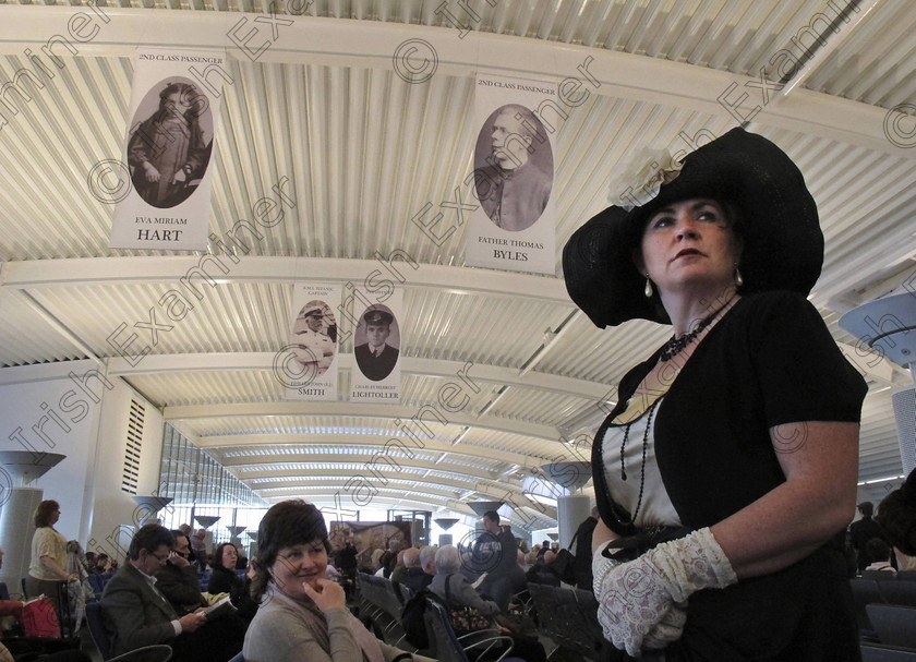 BRITAIN Titanic 21 
 In this photo taken Sunday, April 8, 2012, a passenger wearing a period costume waits at the check-in area to embark the MS Balmoral Titanic memorial cruise ship in Southampton, England. A cruise carrying relatives of some of the more than 1,500 people who died aboard the Titanic nearly 100 years ago set sail from England on Sunday to retrace the ship's voyage, including a visit to the location where it sank. (AP Photo/Lefteris Pitarakis)