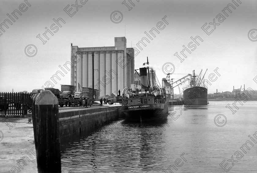 871060 871060 
 For 'READY FOR TARK'
The South Jetties, Cork showing the National Grain Silos 31/05/1953 Ref. 71G old black and white docks docklands ships quays