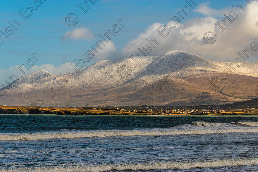 Baile na nGall-Brandon-5778 
 Baile na nGall ( Ballydavid) Co Kerry with a snow capped Brandon mountain range behind,taken from Beal Ban beach Ballyferriter in Feb 2022.Photo by: Noel O Neill 
 Keywords: Beal Ban, Brandon, snow