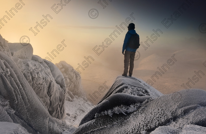 Winter Sunrise 
 Winter sunrise from the summit of Slieve Bearnagh in the Mourne Mountains following an overnight fall of snow. Picture: Brian McCready