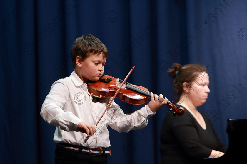 Feis03022020Mon05 
 5 
Anthony Iglody from Blackrock performing. 
Class :241: Violin Solo10Years and Under Mozart – Lied No.4 from ’The Young Violinist’s Repertoire

Feis20: Feis Maitiú festival held in Father Mathew Hall: EEjob: 03/02/2020: Picture: Ger Bonus.