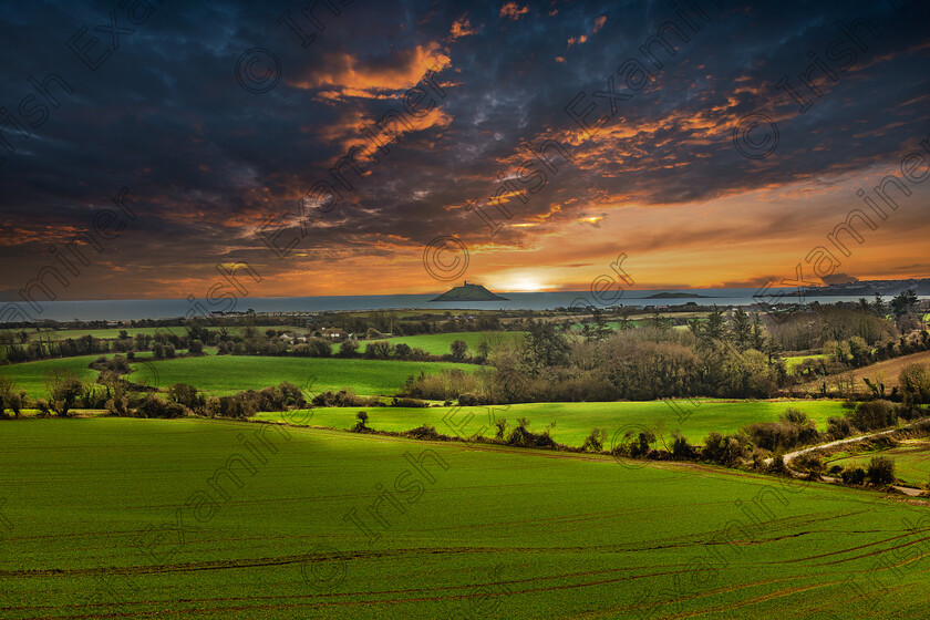 DSC 8998 01-4 
 Sunrise over Ballycotton bay with its iconic lighthouse in the background. Photo: Mark Leo