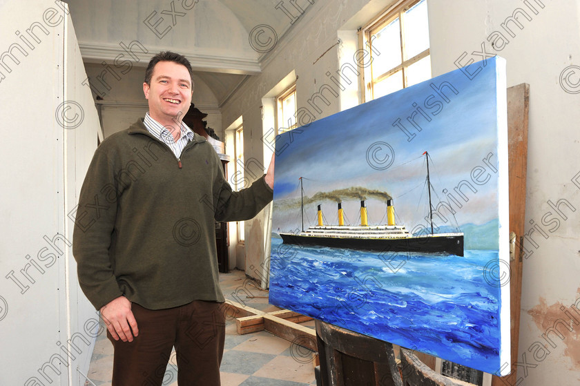 1366755 
 Irish Examiner News Picture 03-12-2011 Cobh Budget special
Gillen Joyce with a painting of the Titanic, by artist Kieran O'Donovan which will be displayed at the Titanic Experience which will open in Cobh, Co Cork January 2012. Picture Dan Linehan