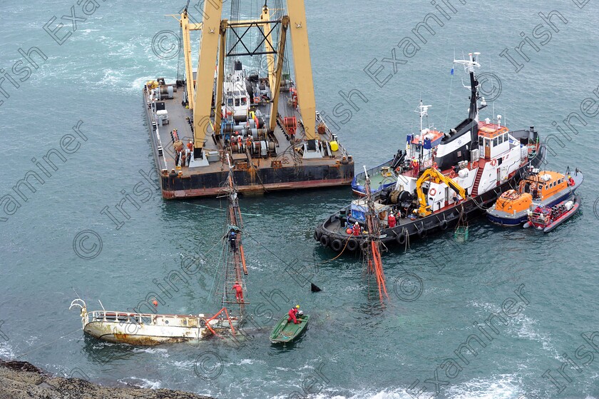 Astrid-ship-22 
 IE LIVE NEWS 09/09/2013 (eoin english story) ... 
Divers and salvage experts making preparations for the salvaging of the tall ship, Astrid, which foundered on a rocky shore west of Oysterhaven in July. 
Picture: Denis Minihane.