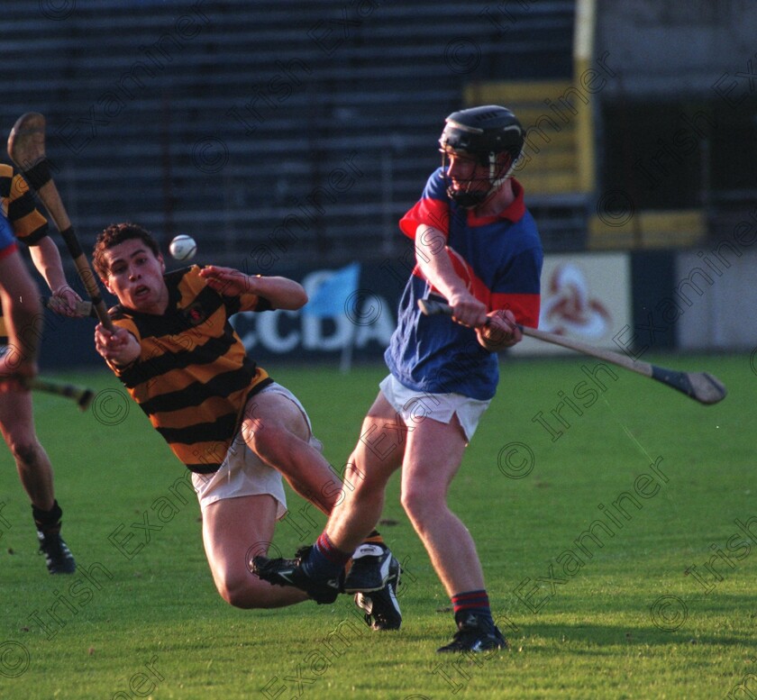 20804 -1372740763 
 NA PIARSAIGH'S SEAN OG O HAILPIN MAKES A GREAT EFFORT TO TRY AND BLOCK THIS SHOT BY ERINS OWN MICHAEL DUNNE DURING THE CORK SHC AT PAIRC UI CHAOIMH ON SATURDAY. PIC EDDIE O'HARE