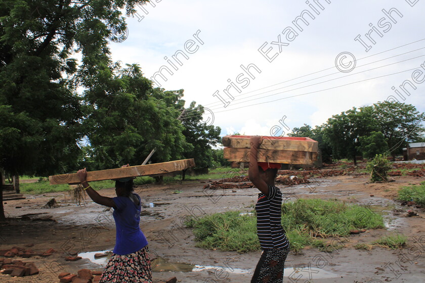 IMG 7927 
 Girls carrying little of what they could salvage from their destroyed house in Chikwawa, Southern Malawi after the severe flooding in early March. Malawi was one of the countries that were affected by Tropical Storm Ana which killed about 112 pepoe and destryed farmland, public infrastructure and displaced over 200000 people over