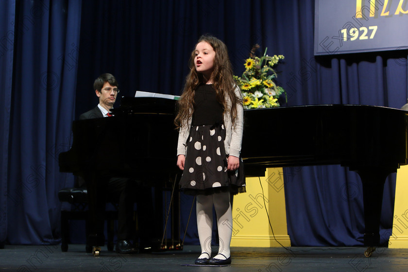 Feis27032018Tue32 
 31~32
Ava Ryan singing backed by Accompanist Michael Young.
 Singing Class: 56: 7 Years and Under Crawley The Penguin Dance Feis Maitiú 92nd Festival held in Fr. Mathew Hall. EEjob 27/03/2018 Picture: Gerard Bonus