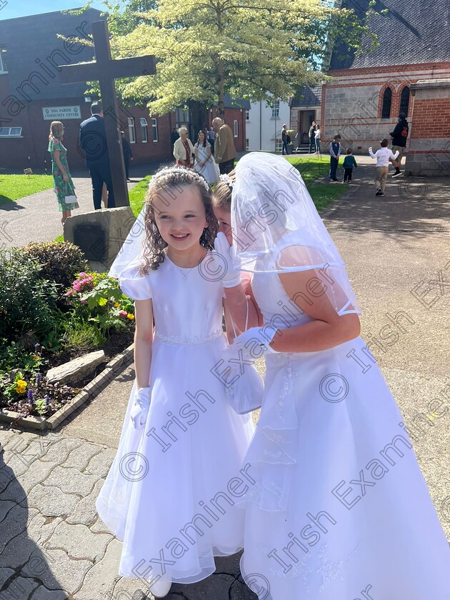 1a02c235-69b1-457d-824b-183154a9e438 
 Aoibhe Jacob and Clara Noonan from Gaelscoil Ui Riarda celebrating their Communion at SMA Church in Wilton