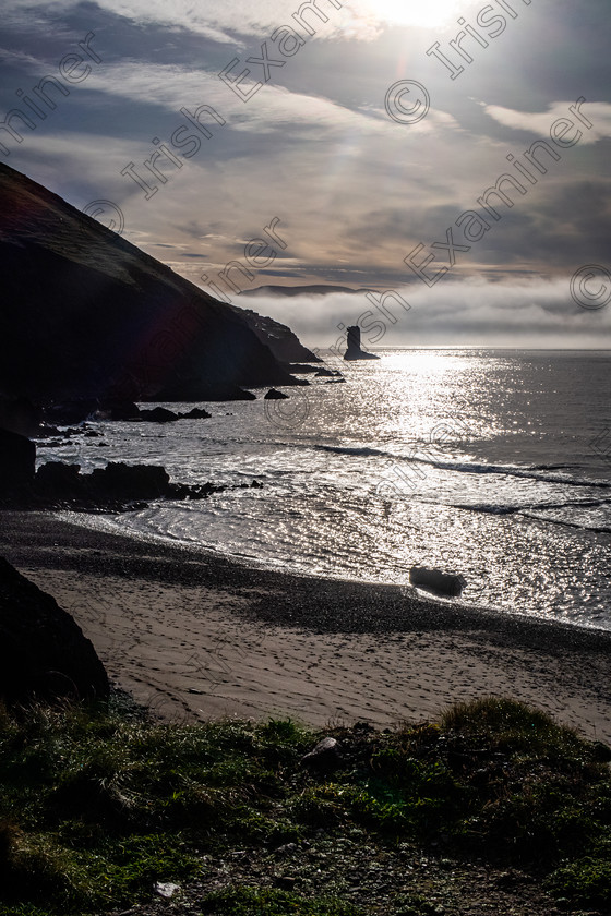 An Searrach-cloud inversion-9632 
 " An Searrach" seastack at Kinard Dingle Co Kerry taken on Dec 1st 2020 by Noel O Neill 
 Keywords: An Searrach, Kinard, Seascape, silhouettes