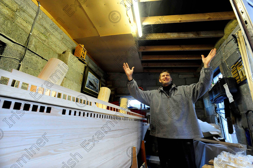 SCA TM 1240685 
 NEWS 19/01/2012 The roof has to be removed. Zoltan Panka beside his 16ft model of the Titanic in the garden shed, 
Picture Denis Scannell 
 Keywords: DENIS SCANNELL