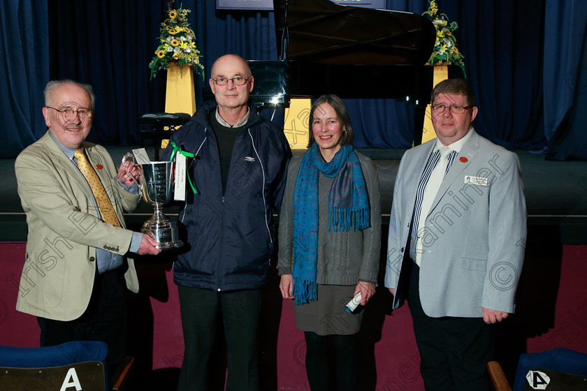 Feis09022018Fri73 
 73
Adjudicator Richard Deering presenting The Capuchin Order Perpetual Cup and Bursary for Seamus Hickey to his parents, Michael and Clare Hickey with Timothy McCarthy, Director.
 Instrumental Music Class: 141: “The Capuchin Order Perpetual Cup and Bursary” Bursary Value €2,500 Sponsored by the Capuchin Order Advanced Recital Programme 18 Years and Over Feis Maitiú 92nd Festival held in Fr. Mathew Hall. EEjob 09/02/2018 Picture: Gerard Bonus.