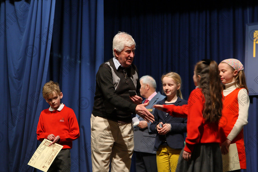 Feis22032018Thu12 
 12
Gracie Blessing receiving her Silver Medal from Adjudicator Seán Ó Muineacháin.
 Labhairt na Filíocht agus Míreanna Drámaíochta Class: 516: Bhéarslabhairt 9 Bliana D’Aois Nó Faoina Roinn 2 Feis Maitiú 92nd Festival held in Fr. Mathew Hall. EEjob 22/03/2018 Picture: Gerard Bonus