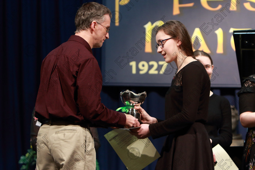 Feis0402109Mon50 
 49
George Allen Grandson of Bernard Curtis presenting the Cup to Anna Jansson from Wilton.

Class: 156: “The Bernard Curtis Memorial Perpetual Cup” Piano Sonata
Two contrasting movements or a one movement Sonata.

Feis Maitiú 93rd Festival held in Fr. Matthew Hall. EEjob 04/02/2019. Picture: Gerard Bonus