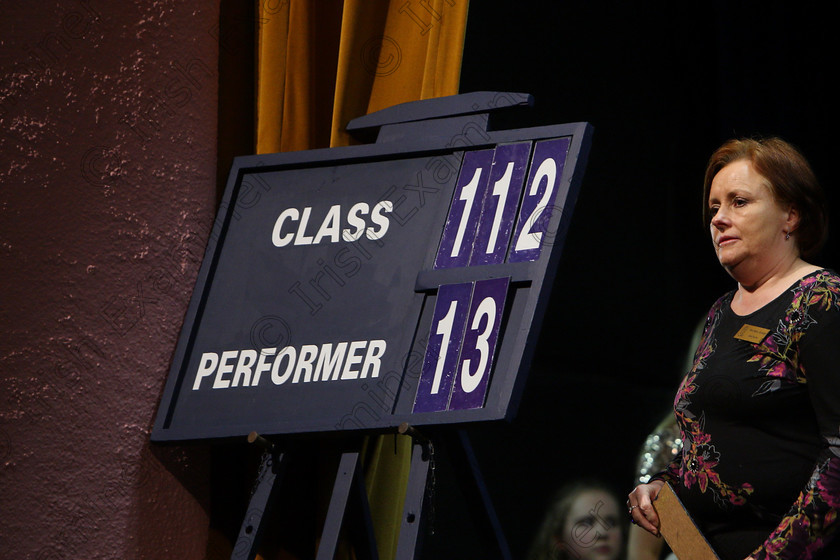 Feis07032018Wed21 
 21
Stagehand Edel Burke introducing the next performer.
 Singing and School Choirs Class: 112: “The C.A.D.A. Perpetual Trophy” Solo Action Song 14 Years and Under Section 1 Feis Maitiú 92nd Festival held in Fr. Mathew Hall. EEjob 06/03/2018 Picture: Gerard Bonus.