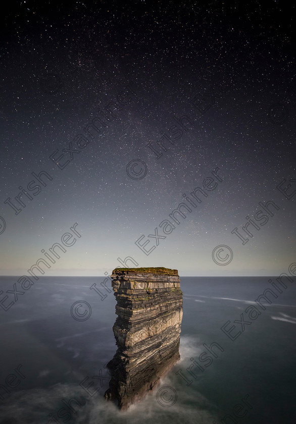 Max Malloy Downpatrick Head 
 Downpatrick Head in county Mayo under the stars and the full moon