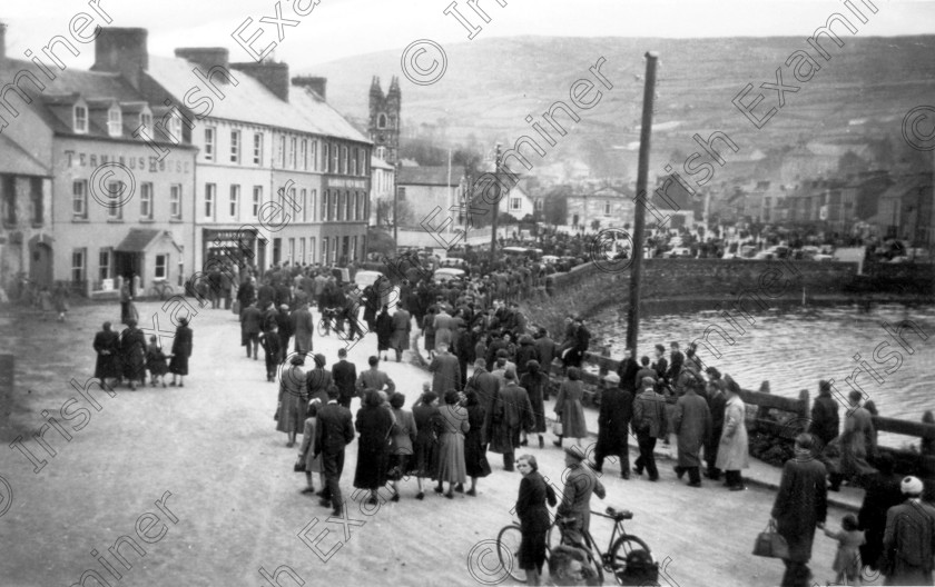 1010501 
 For 'READY FOR TARK'
Some of the 700 people who came to Bantry for a GAA match on the first diesel railcar excursion from Bandon 11/4/1954 old black and white west cork (Pic. Walter McGrath) old black and white railways trains